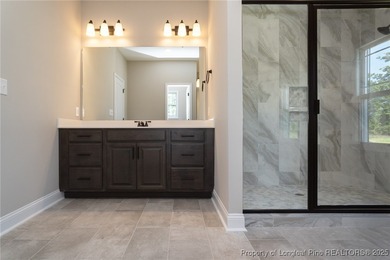 Located in a Gated, golf community with top-rated Jack Britt on Gates Four Golf and Country Club in North Carolina - for sale on GolfHomes.com, golf home, golf lot