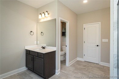 Located in a Gated, golf community with top-rated Jack Britt on Gates Four Golf and Country Club in North Carolina - for sale on GolfHomes.com, golf home, golf lot