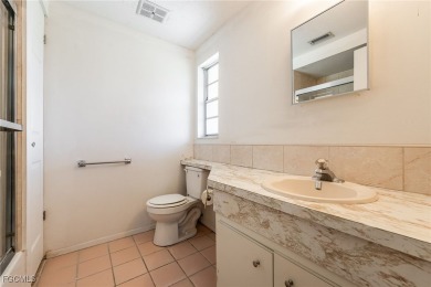This affordable gem is perfect for a first-time homebuyer or on Port Charlotte Golf Club in Florida - for sale on GolfHomes.com, golf home, golf lot