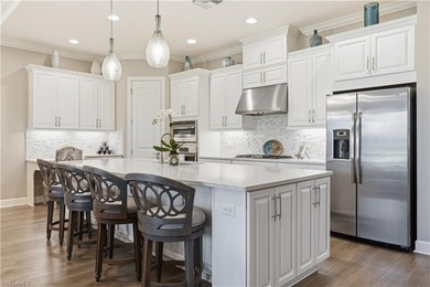 Experience resort-style living in Esplanade Golf & Country Club on Esplanade Golf and  Country Club in Florida - for sale on GolfHomes.com, golf home, golf lot