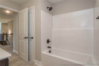 Located in a Gated, golf community with top-rated Jack Britt on Gates Four Golf and Country Club in North Carolina - for sale on GolfHomes.com, golf home, golf lot