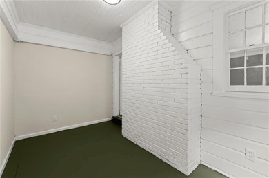 This charming, updated 2-bedroom, 1-bath home offers a rare on John A. White Golf Course in Georgia - for sale on GolfHomes.com, golf home, golf lot