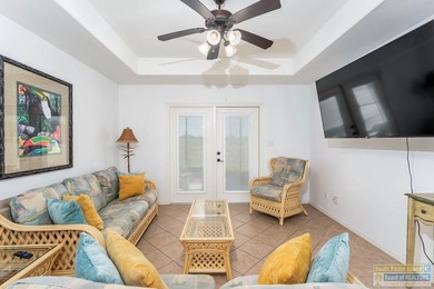 Discover this charming 2-bedroom, 2-bath home at 80 Bethpage Dr on South Padre Island Golf Club in Texas - for sale on GolfHomes.com, golf home, golf lot