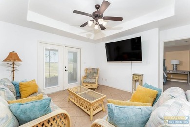 Discover this charming 2-bedroom, 2-bath home at 80 Bethpage Dr on South Padre Island Golf Club in Texas - for sale on GolfHomes.com, golf home, golf lot