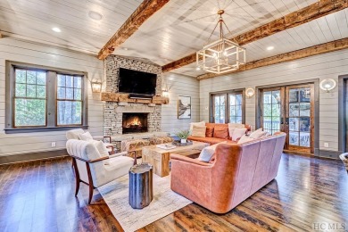 Explore the perfect blend of rustic charm and luxury in this on Mountaintop Golf and Lake Club in North Carolina - for sale on GolfHomes.com, golf home, golf lot