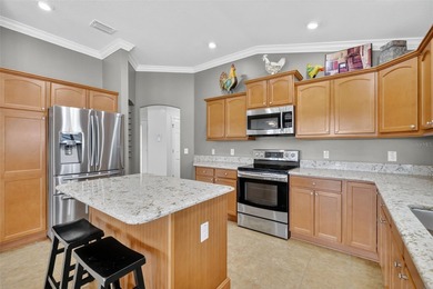 ENJOY GORGEOUS CHAMPIONSHIP GOLF FRONT VIEWS in this 3/2 on Cane  Garden Golf Course in Florida - for sale on GolfHomes.com, golf home, golf lot