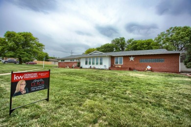 This stunning 4-bed, 3-bath ranch is perched directly across on Ellis Country Club in Kansas - for sale on GolfHomes.com, golf home, golf lot