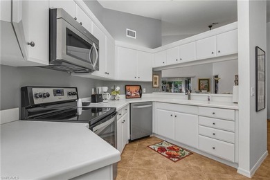 This large Fountain Lakes villa offers a huge Florida room with on Fountain Lakes Community Golf Course in Florida - for sale on GolfHomes.com, golf home, golf lot