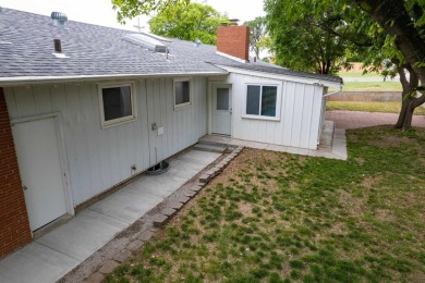 This stunning 4-bed, 3-bath ranch is perched directly across on Ellis Country Club in Kansas - for sale on GolfHomes.com, golf home, golf lot