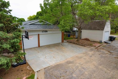 This stunning 4-bed, 3-bath ranch is perched directly across on Ellis Country Club in Kansas - for sale on GolfHomes.com, golf home, golf lot