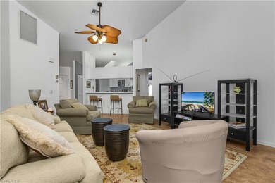 This large Fountain Lakes villa offers a huge Florida room with on Fountain Lakes Community Golf Course in Florida - for sale on GolfHomes.com, golf home, golf lot