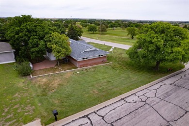 This stunning 4-bed, 3-bath ranch is perched directly across on Ellis Country Club in Kansas - for sale on GolfHomes.com, golf home, golf lot