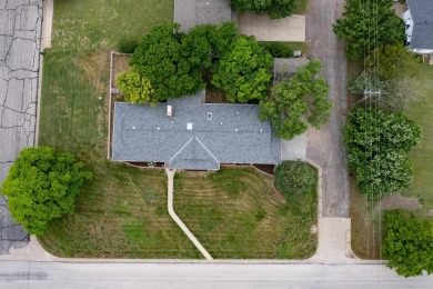 This stunning 4-bed, 3-bath ranch is perched directly across on Ellis Country Club in Kansas - for sale on GolfHomes.com, golf home, golf lot