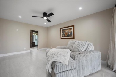 Meticulously renovated 3BR/3BA main home plus detached 1BR/1BA on Palm Beach Polo and Country Club in Florida - for sale on GolfHomes.com, golf home, golf lot