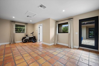 Meticulously renovated 3BR/3BA main home plus detached 1BR/1BA on Palm Beach Polo and Country Club in Florida - for sale on GolfHomes.com, golf home, golf lot