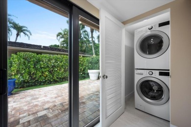 Meticulously renovated 3BR/3BA main home plus detached 1BR/1BA on Palm Beach Polo and Country Club in Florida - for sale on GolfHomes.com, golf home, golf lot