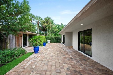 Meticulously renovated 3BR/3BA main home plus detached 1BR/1BA on Palm Beach Polo and Country Club in Florida - for sale on GolfHomes.com, golf home, golf lot
