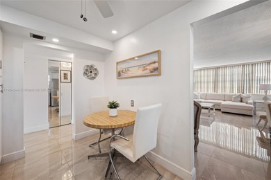 Stunning corner unit condo in the desirable Park Place 55+ on Pembroke Lakes Golf Club in Florida - for sale on GolfHomes.com, golf home, golf lot