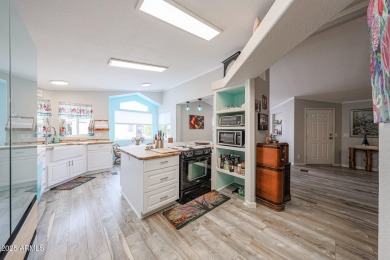 This beautifully updated home sits on an oversized lot and has on Paradise Peak Golf Course in Arizona - for sale on GolfHomes.com, golf home, golf lot