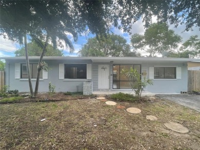 Charming 3 bedrooms, 2 baths home with a versatile den in on Pompano Beach Golf Course  in Florida - for sale on GolfHomes.com, golf home, golf lot