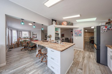 This beautifully updated home sits on an oversized lot and has on Paradise Peak Golf Course in Arizona - for sale on GolfHomes.com, golf home, golf lot