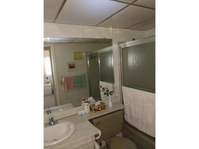 This 2/2 villa sits directly on the golf course which is free to on Leisureville Community Golf Course in Florida - for sale on GolfHomes.com, golf home, golf lot
