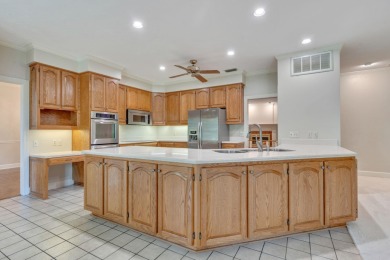 Situated on 0.67 acres along the 9th hole in Golden Eagle, this on Golden Eagle Country Club in Florida - for sale on GolfHomes.com, golf home, golf lot