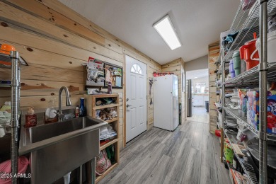 This beautifully updated home sits on an oversized lot and has on Paradise Peak Golf Course in Arizona - for sale on GolfHomes.com, golf home, golf lot