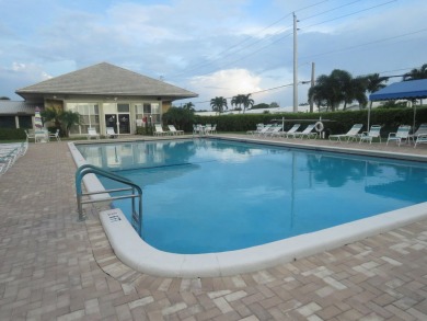 This 2/2 villa sits directly on the golf course which is free to on Leisureville Community Golf Course in Florida - for sale on GolfHomes.com, golf home, golf lot