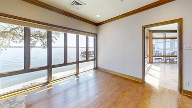 UNBELIEVABLE WATERFRONT home on Lake Granbury! This on De Cordova Bend Country Club in Texas - for sale on GolfHomes.com, golf home, golf lot