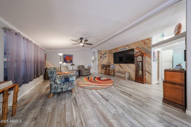 This beautifully updated home sits on an oversized lot and has on Paradise Peak Golf Course in Arizona - for sale on GolfHomes.com, golf home, golf lot