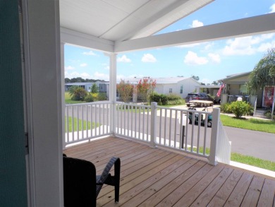 2021 Palm Harbor  "Summer Breeze " home, meticulously on Schalamar Creek Golf and Country Club in Florida - for sale on GolfHomes.com, golf home, golf lot