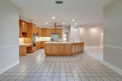 Situated on 0.67 acres along the 9th hole in Golden Eagle, this on Golden Eagle Country Club in Florida - for sale on GolfHomes.com, golf home, golf lot