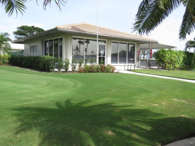 This 2/2 villa sits directly on the golf course which is free to on Leisureville Community Golf Course in Florida - for sale on GolfHomes.com, golf home, golf lot