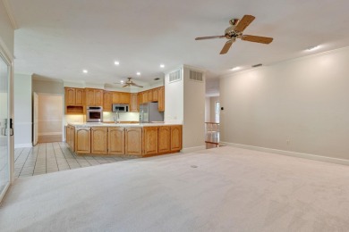 Situated on 0.67 acres along the 9th hole in Golden Eagle, this on Golden Eagle Country Club in Florida - for sale on GolfHomes.com, golf home, golf lot
