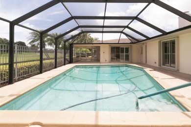 WELCOME TO THIS SANDPIPER BAY BEAUTY!  ENTERTAINERS DREAM WITH on The Saints At Port St Lucie Golf Course in Florida - for sale on GolfHomes.com, golf home, golf lot
