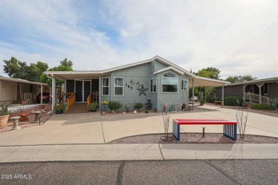 This beautifully updated home sits on an oversized lot and has on Paradise Peak Golf Course in Arizona - for sale on GolfHomes.com, golf home, golf lot