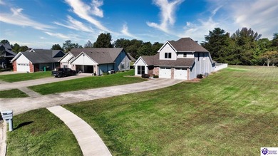 Nestled across from the fairway of the Heartland Golf Club, this on Pine Valley Golf Resort in Kentucky - for sale on GolfHomes.com, golf home, golf lot
