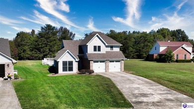 Nestled across from the fairway of the Heartland Golf Club, this on Pine Valley Golf Resort in Kentucky - for sale on GolfHomes.com, golf home, golf lot