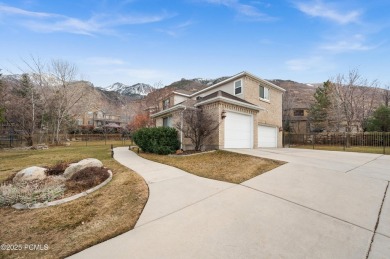 Nestled in a quiet cul-de-sac, this spacious 5-bedroom on Hidden Valley Country Club in Utah - for sale on GolfHomes.com, golf home, golf lot