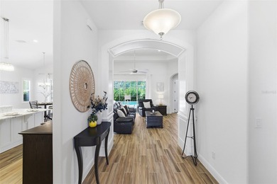 WELCOME HOME to this stunning Canary Model Pool Home located in on Harbor Hills Country Club in Florida - for sale on GolfHomes.com, golf home, golf lot