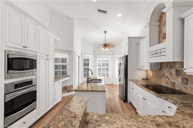 Tucked away on a quiet cul-de-sac in the heart of Bonita Bay on Bonita Bay West in Florida - for sale on GolfHomes.com, golf home, golf lot