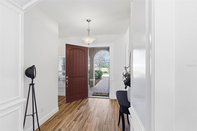 WELCOME HOME to this stunning Canary Model Pool Home located in on Harbor Hills Country Club in Florida - for sale on GolfHomes.com, golf home, golf lot