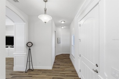 WELCOME HOME to this stunning Canary Model Pool Home located in on Harbor Hills Country Club in Florida - for sale on GolfHomes.com, golf home, golf lot