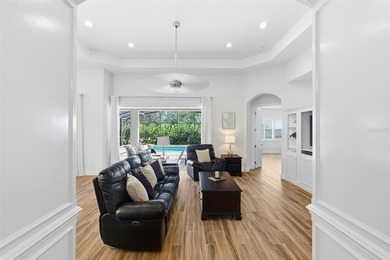 WELCOME HOME to this stunning Canary Model Pool Home located in on Harbor Hills Country Club in Florida - for sale on GolfHomes.com, golf home, golf lot