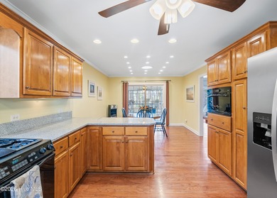 Nestled in St. James Plantation, this spacious home sits on a on Members Club At St. James Plantation in North Carolina - for sale on GolfHomes.com, golf home, golf lot