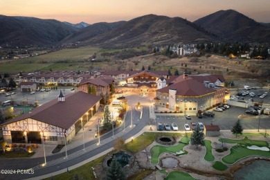 Embrace the charm of alpine living in this elegant second-floor on Homestead Golf Club and Resort in Utah - for sale on GolfHomes.com, golf home, golf lot