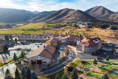 Embrace the charm of alpine living in this elegant second-floor on Homestead Golf Club and Resort in Utah - for sale on GolfHomes.com, golf home, golf lot