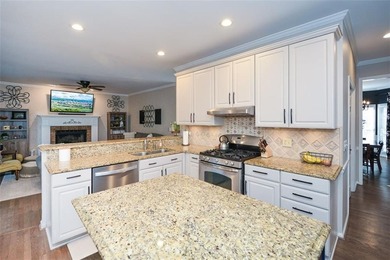 Imagine pulling into the driveway of a stunning traditional on Canongate At Eagle Watch Golf Club in Georgia - for sale on GolfHomes.com, golf home, golf lot