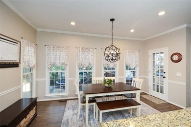 Imagine pulling into the driveway of a stunning traditional on Canongate At Eagle Watch Golf Club in Georgia - for sale on GolfHomes.com, golf home, golf lot